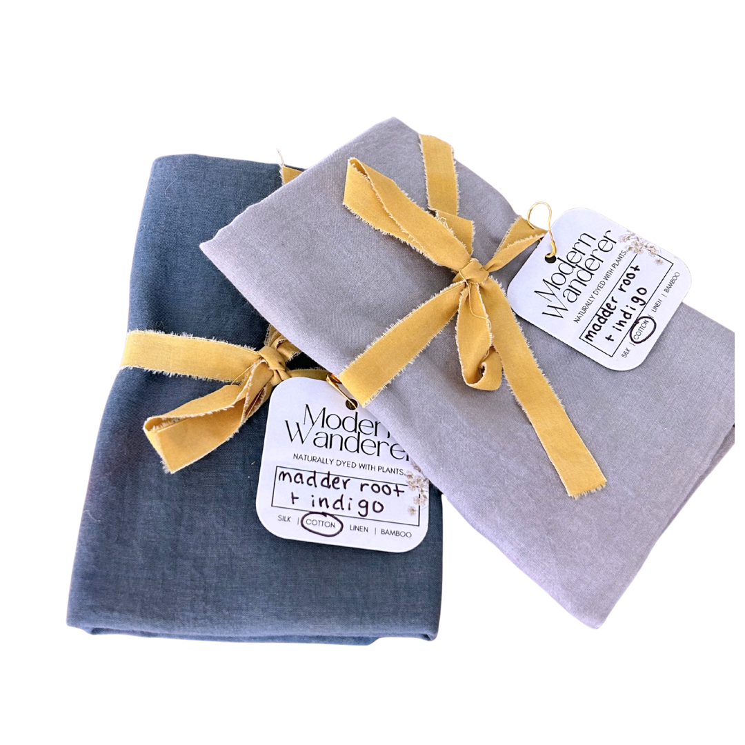 Two plant dyed organic cotton bandanas. Light and dark purple. Naturally dyed with madder root and indigo.