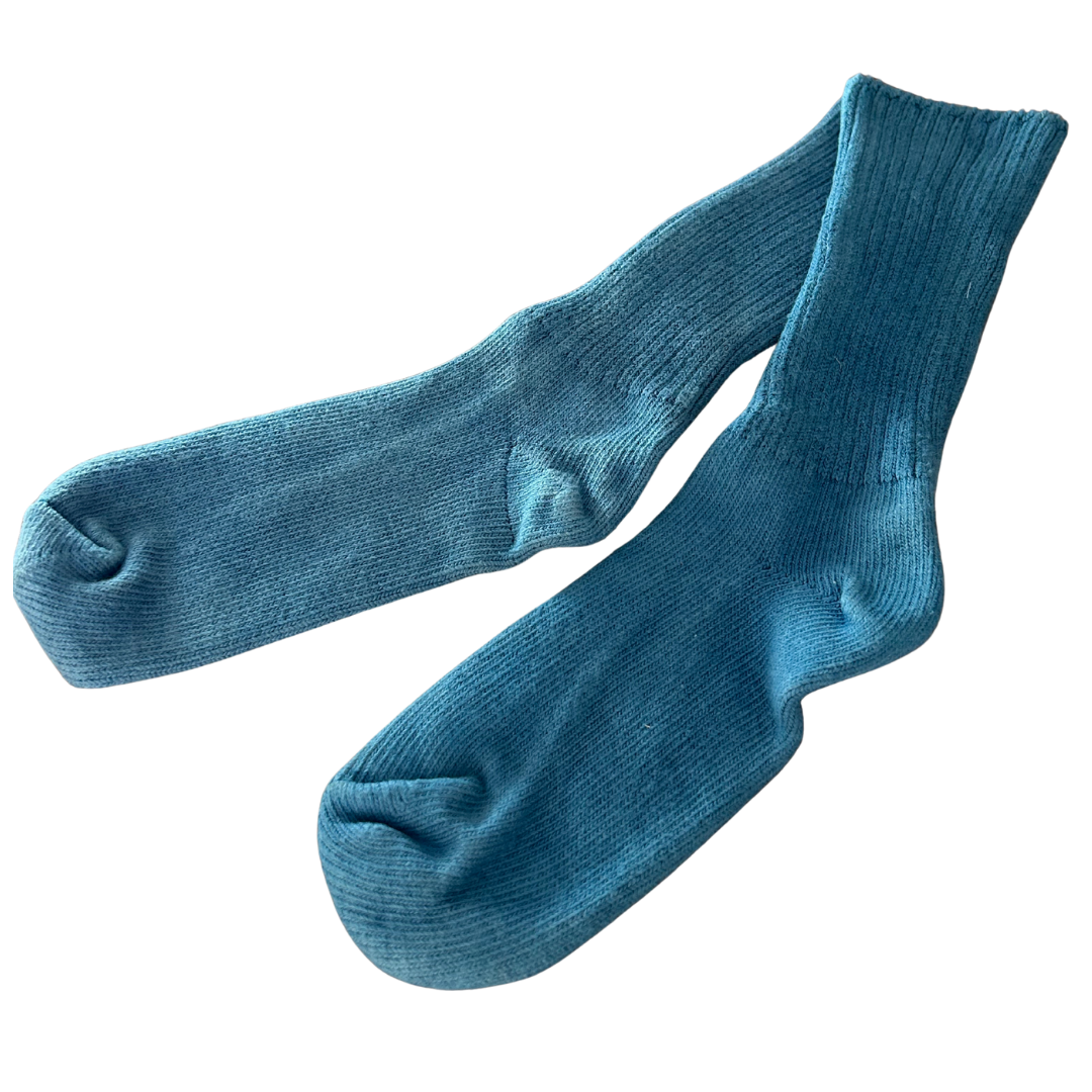 Pair of blue organic cotton socks, naturally dyed with indigo.
Plant dyed socks.