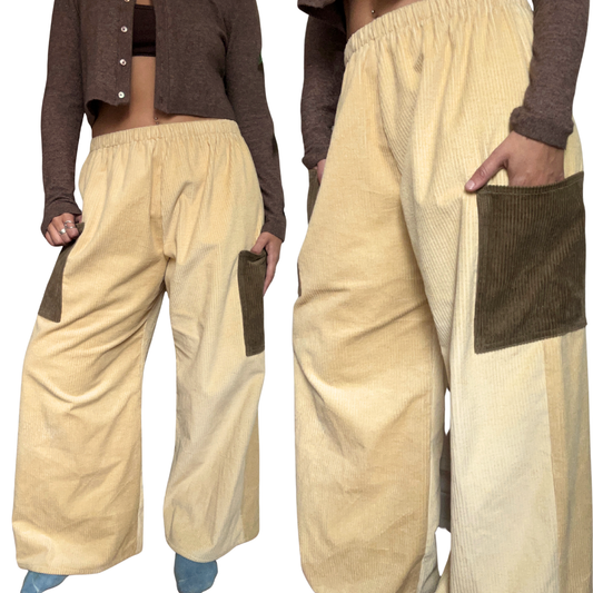 Beige corduroy pants with brown accents worn by a person on a white background.
Naturally dyed with black walnut.